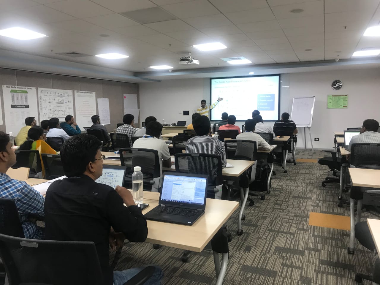 Surya facilitating a corporate SAFe classroom session